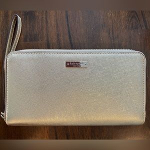 Gold Kate Spade zip-around wallet